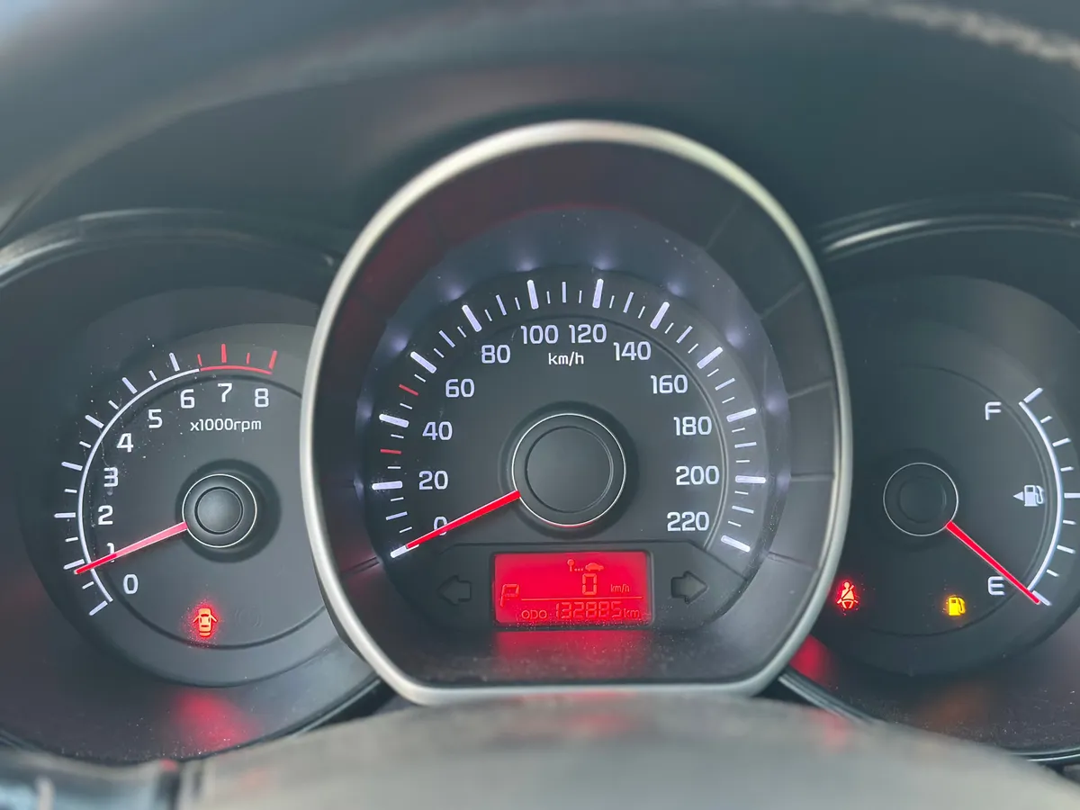 Kia Rio 1.4 AT (107 л.с.), 2014 — фото 11