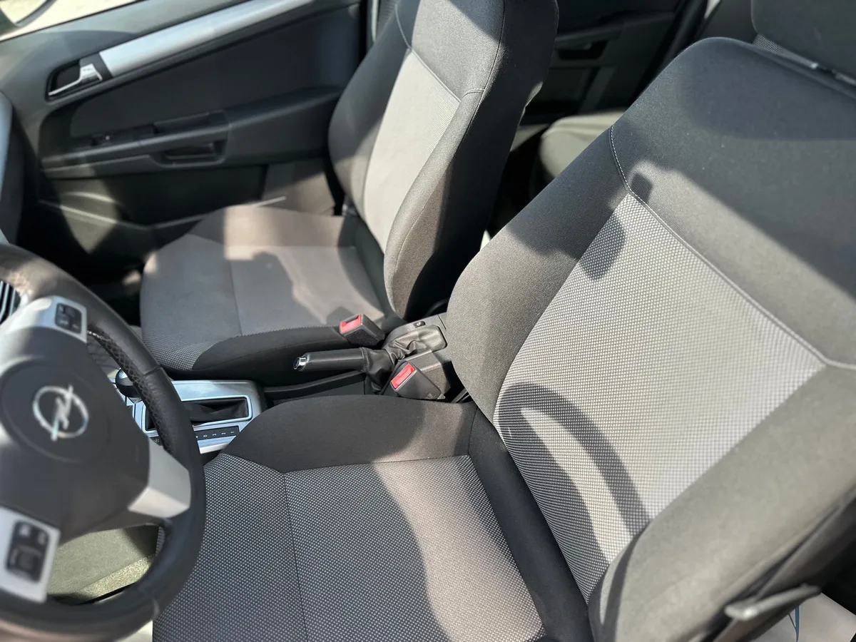 Opel Astra 1.8 AT (140 л.с.)