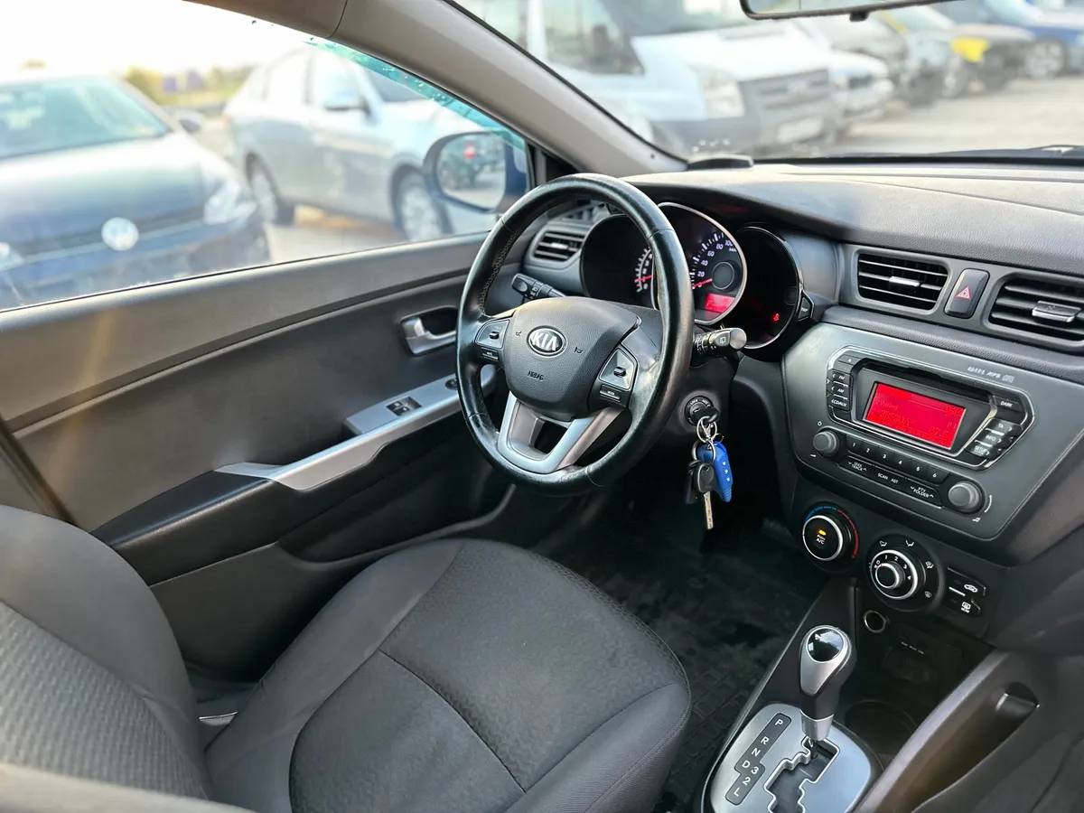 Kia Rio 1.4 AT (107 л.с.), 2014 — фото 7