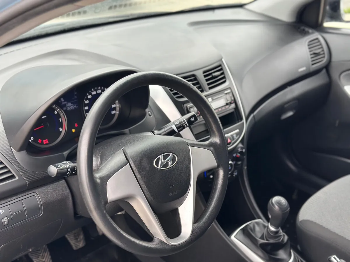 Hyundai Solaris 1.6 MT (123 л.с.), 2014 — фото 7