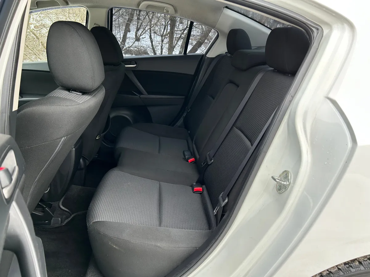 Mazda 3 1.6 AT (104 л.с.)