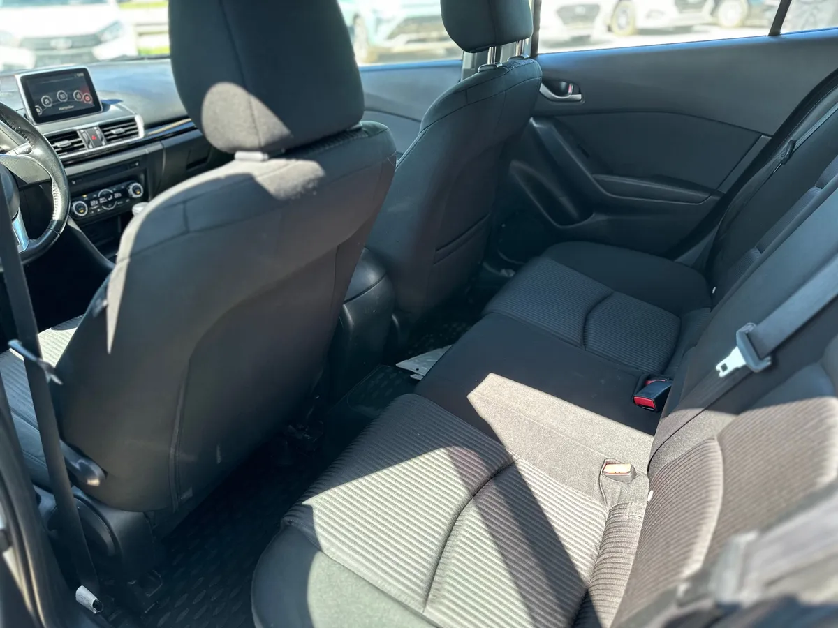 Mazda 3 1.6 AT (104 л.с.)