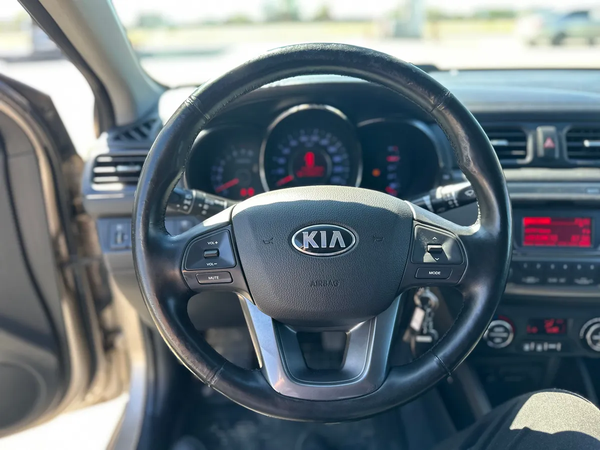 Kia Rio 1.6 MT (123 л.с.), 2013 — фото 8