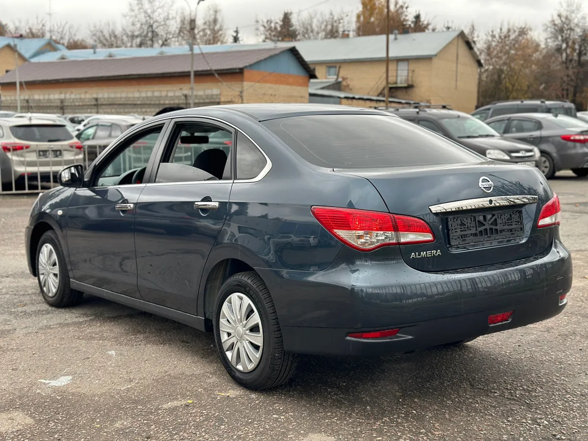 Nissan Almera 1.6 AT (102 л.с.)