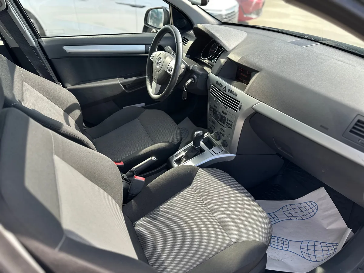 Opel Astra 1.8 AT (140 л.с.)