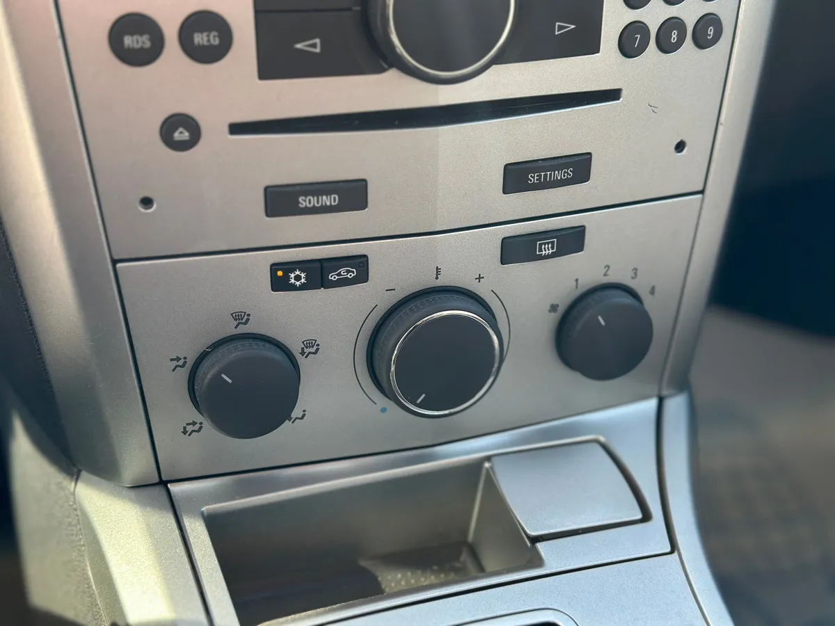 Opel Astra 1.8 AT (140 л.с.)