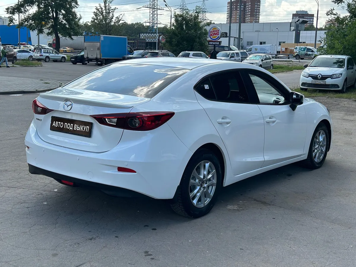 Mazda 3 1.6 AT (104 л.с.)