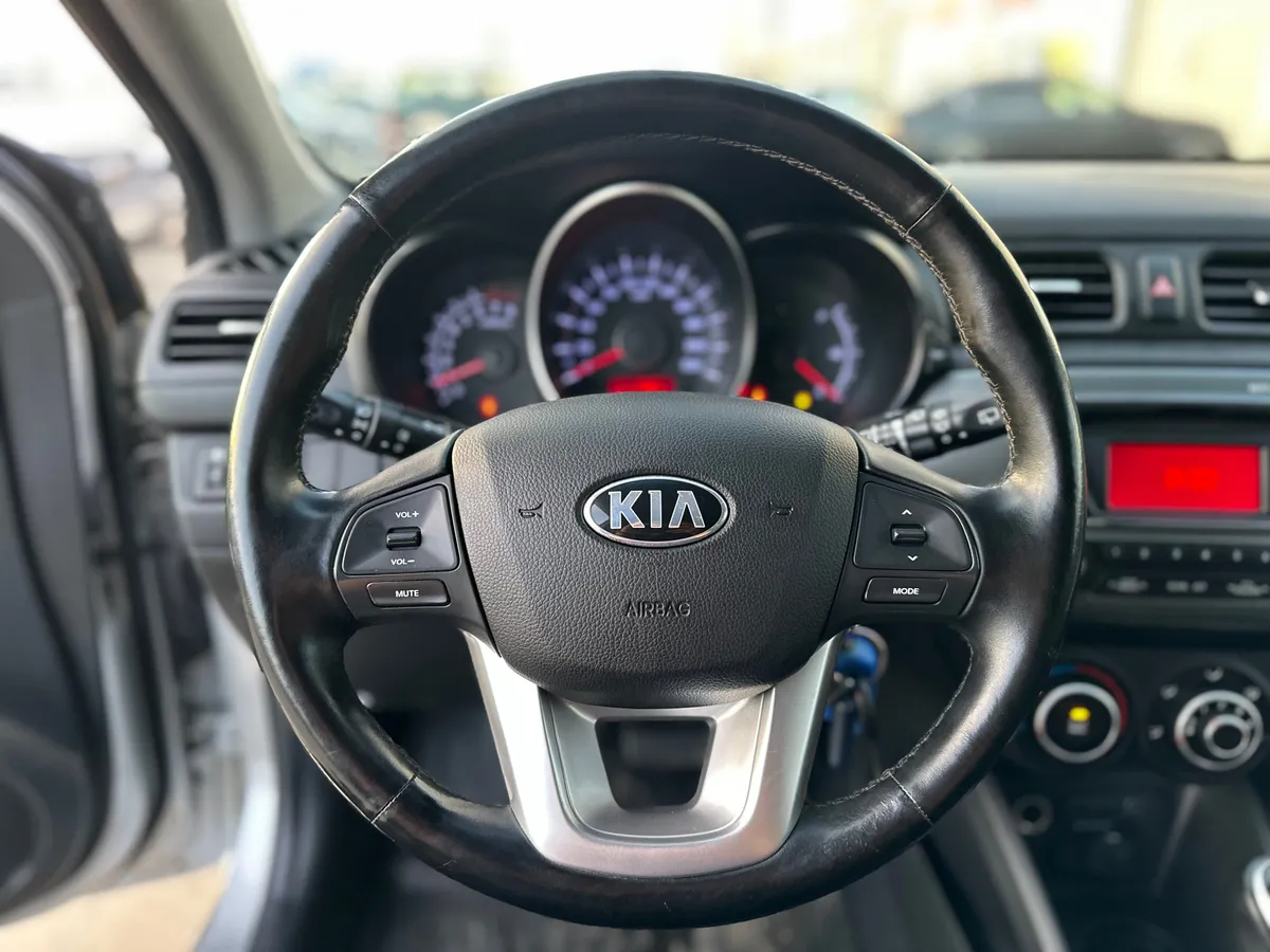 Kia Rio 1.4 AT (107 л.с.), 2014 — фото 10