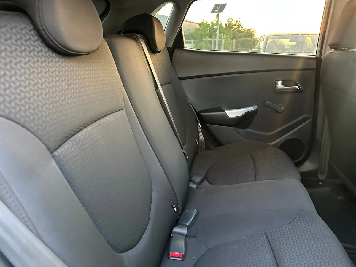 Kia Rio 1.4 AT (107 л.с.), 2014 — фото 21