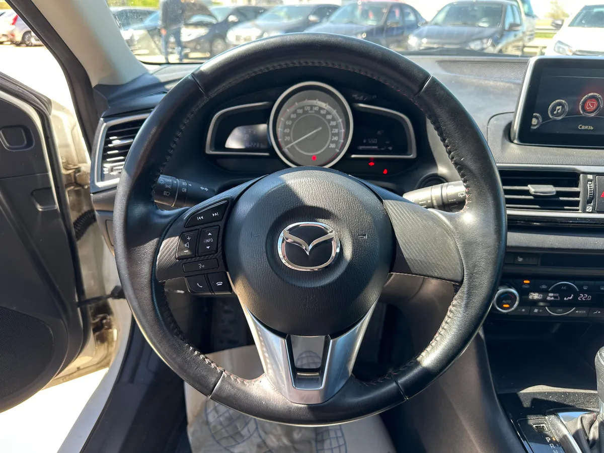 Mazda 3 1.6 AT (104 л.с.)