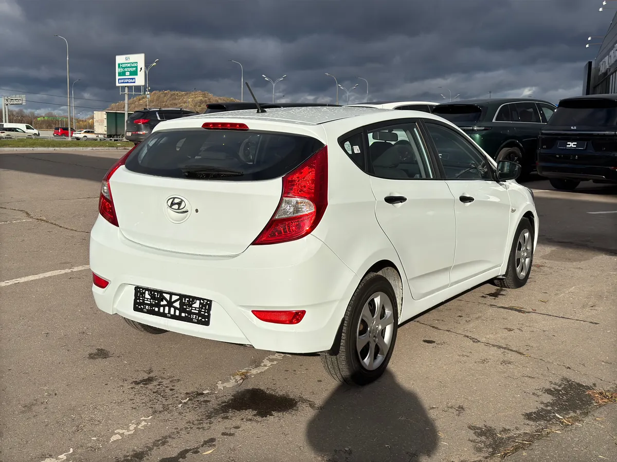 Hyundai Solaris 1.4 AT (107 л.с.), 2013 — фото 4