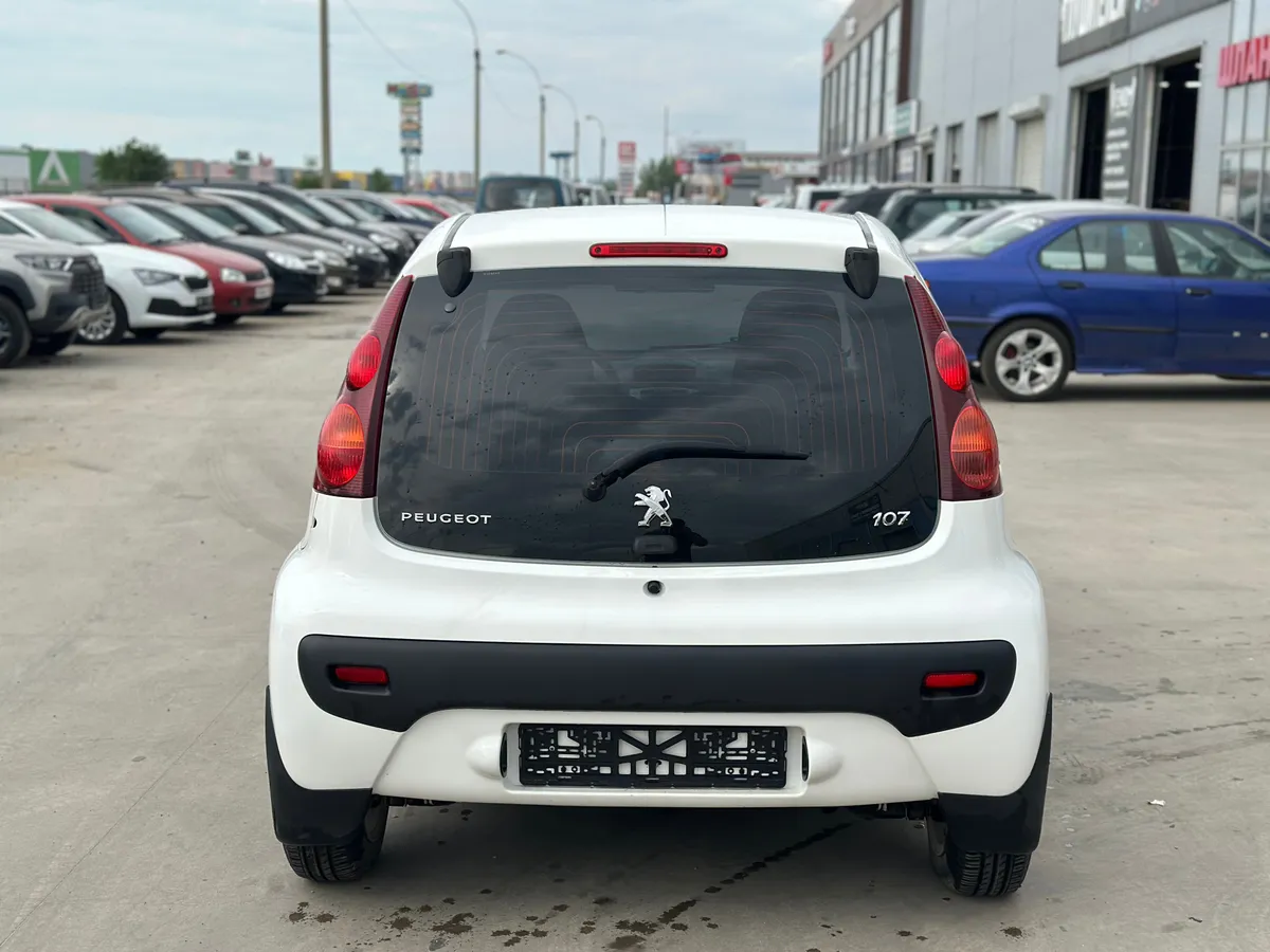 Peugeot 107 1.0 2-tronic (68 л.с.)
