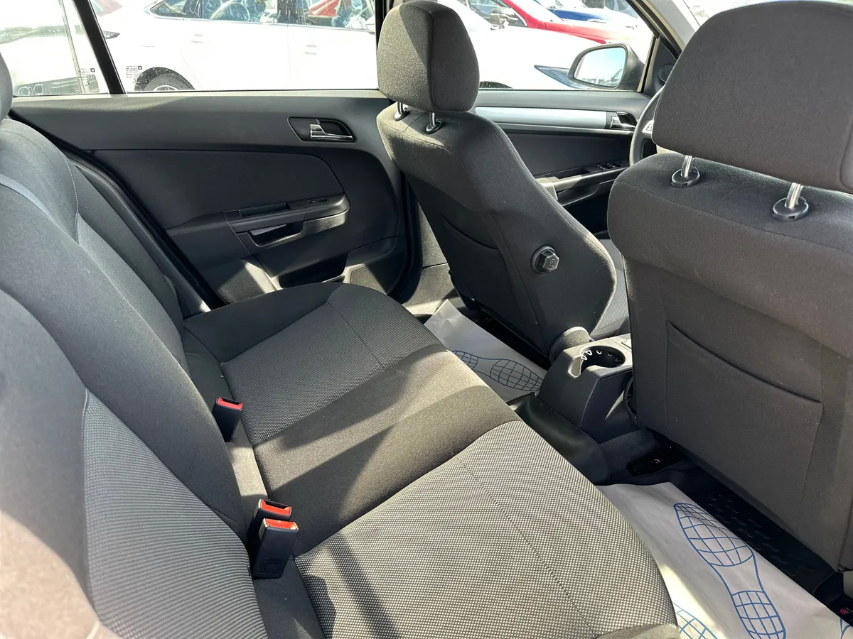 Opel Astra 1.8 AT (140 л.с.)