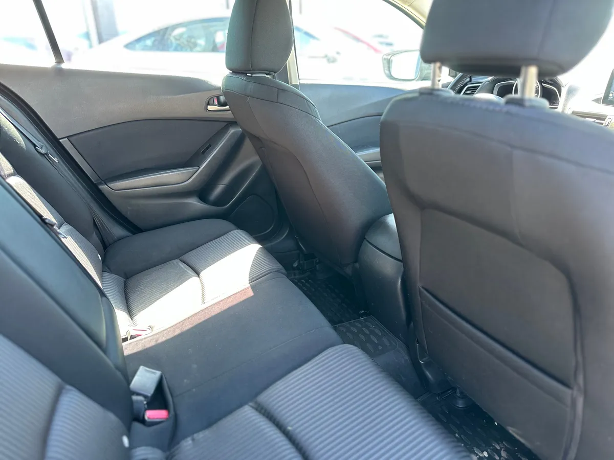 Mazda 3 1.6 AT (104 л.с.)