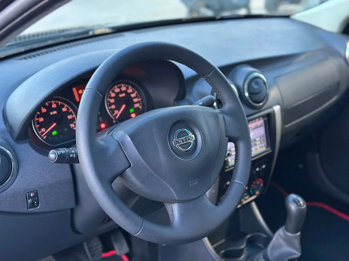 Nissan Almera 1.6 MT (102 л.с.)