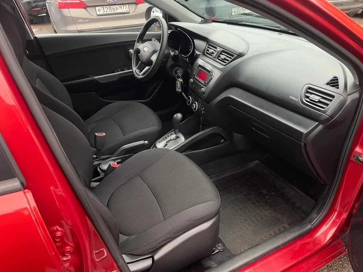 Kia Rio 1.6 AT (123 л.с.), 2013 — фото 5