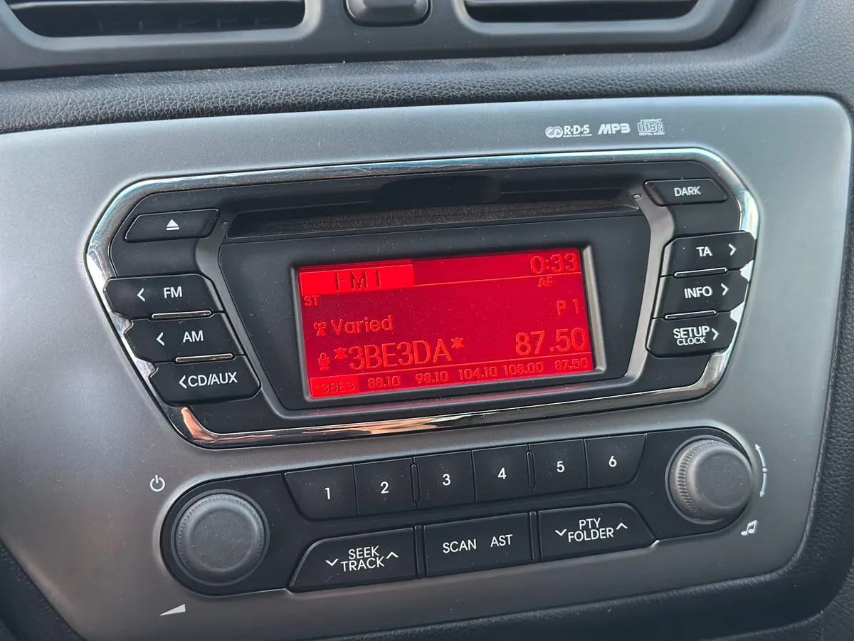Kia Rio 1.4 AT (107 л.с.), 2014 — фото 13