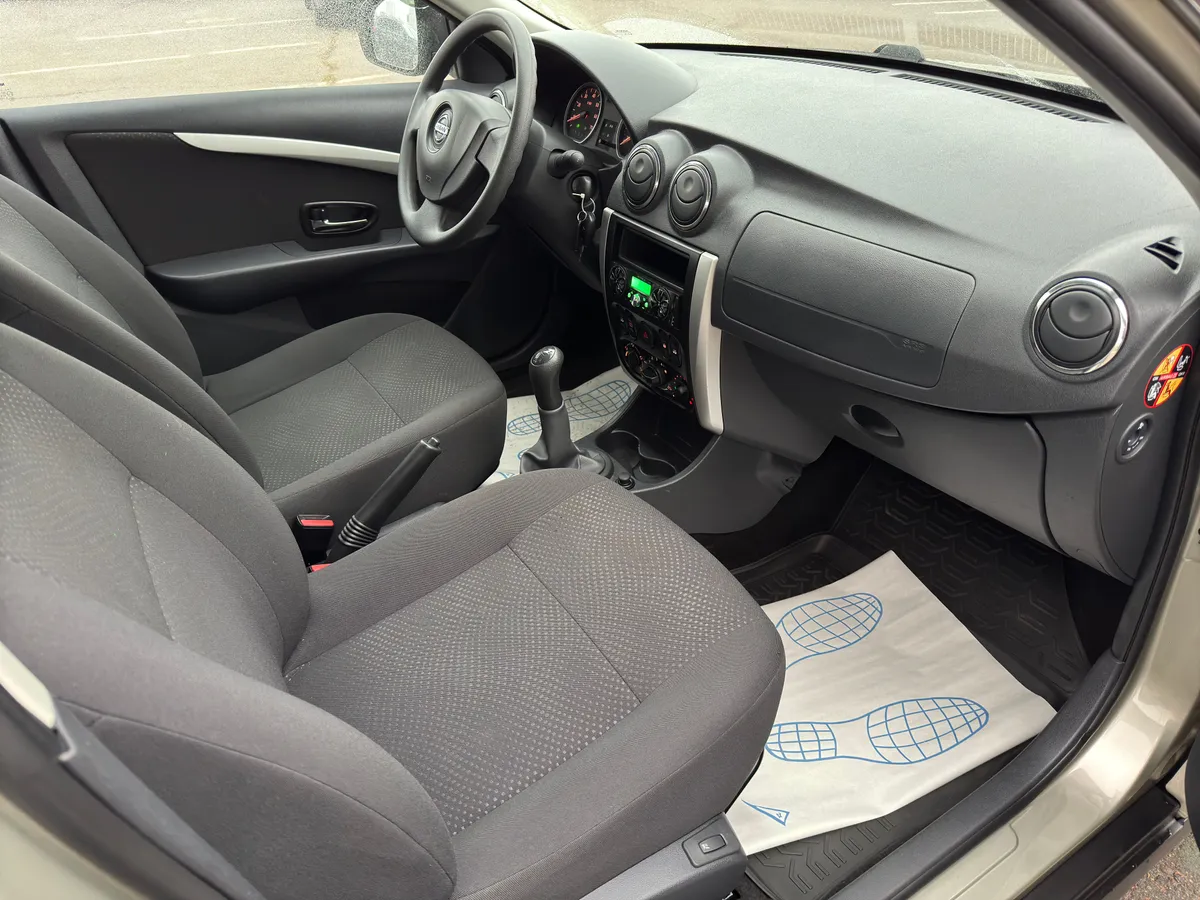 Nissan Almera 1.6 MT (102 л.с.)