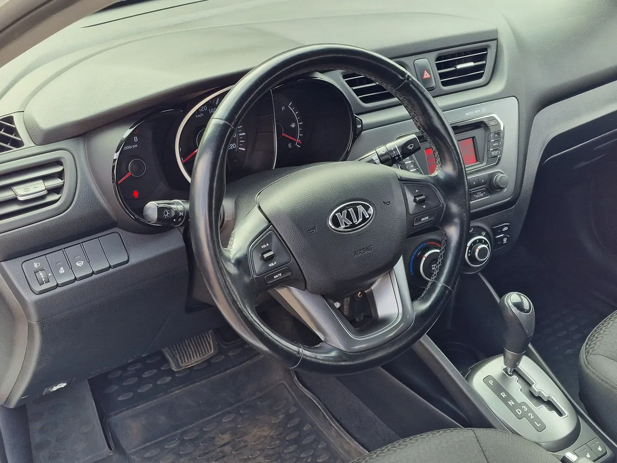 Kia Rio 1.4 AT (107 л.с.)