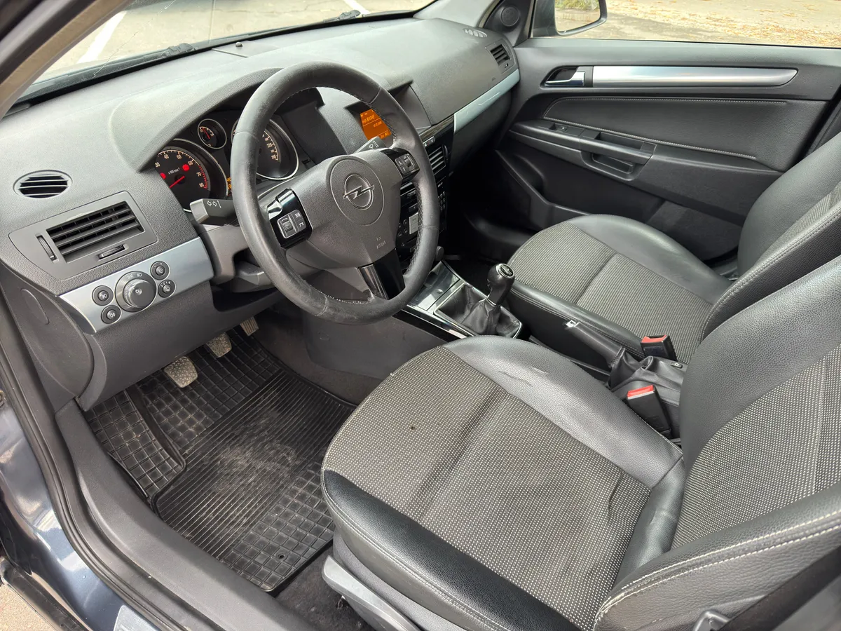 Opel Astra 1.6 MT (115 л.с.)