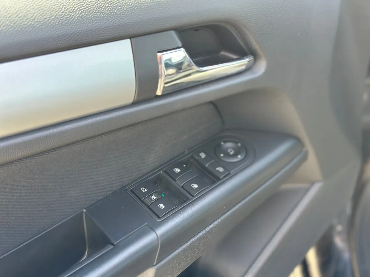 Opel Astra 1.8 AT (140 л.с.)