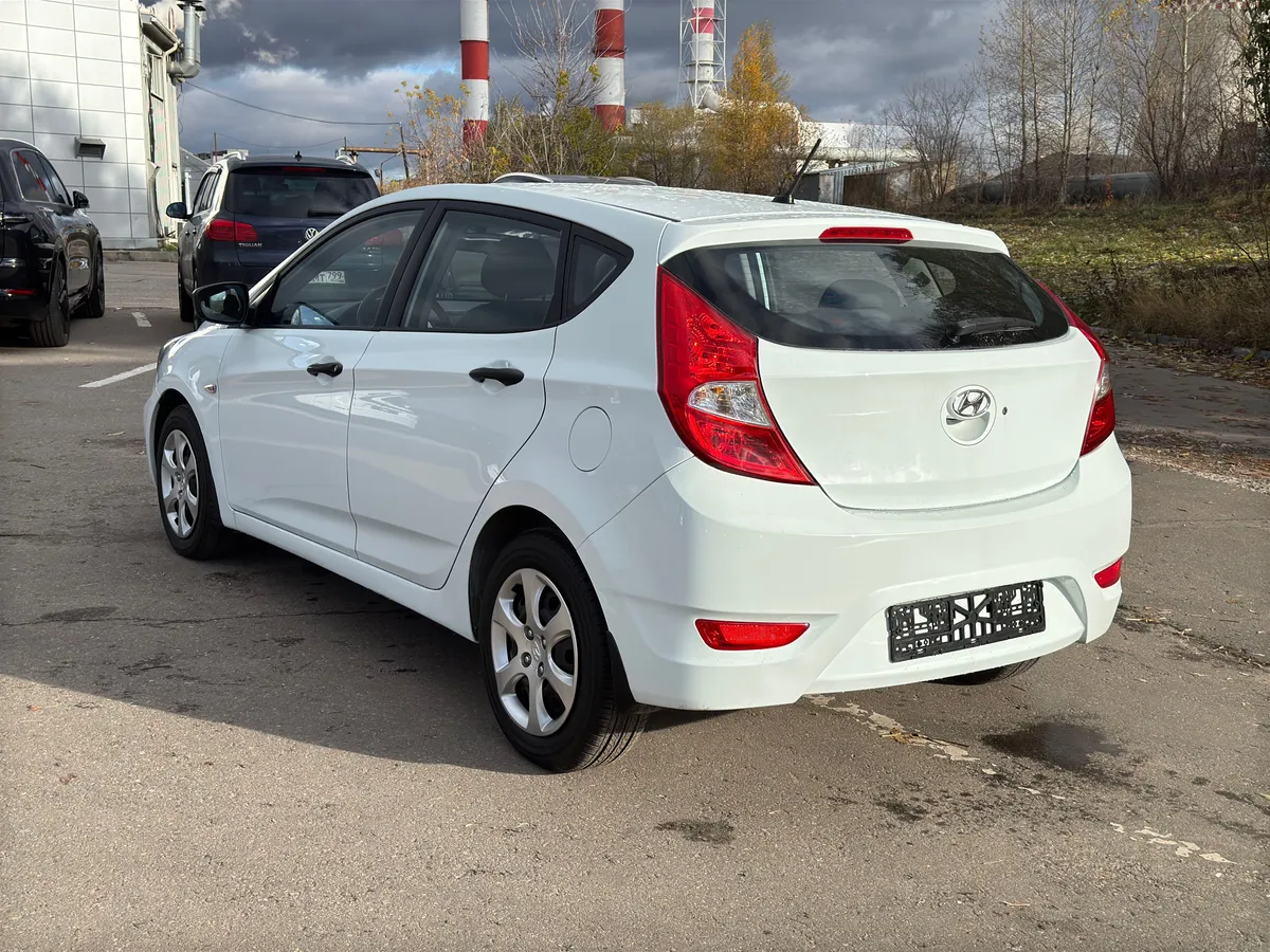 Hyundai Solaris 1.4 AT (107 л.с.), 2013 — фото 2