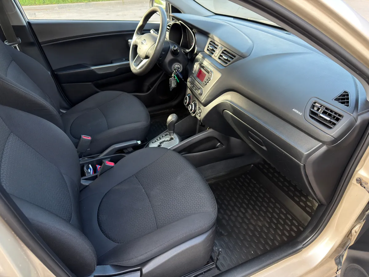 Kia Rio 1.4 AT (107 л.с.)