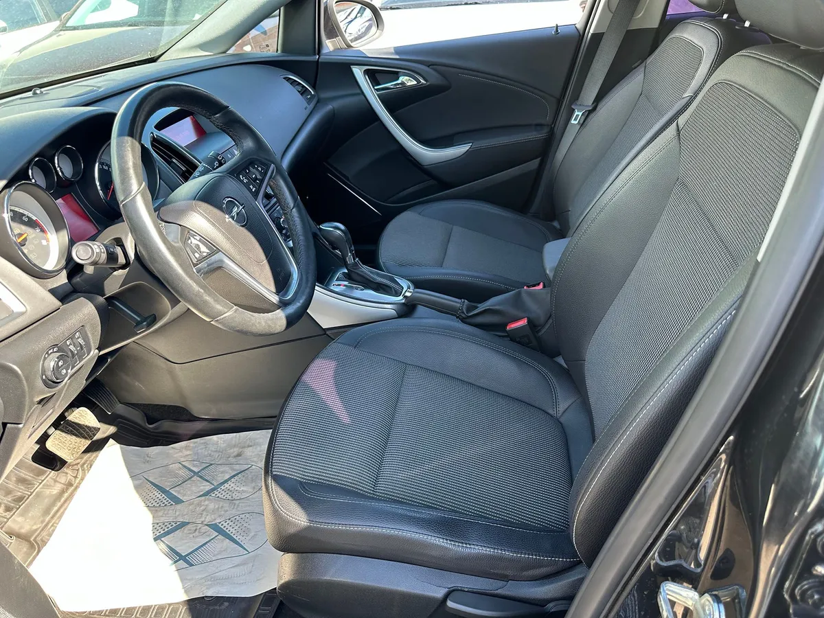 Opel Astra 1.6 AT (115 л.с.)