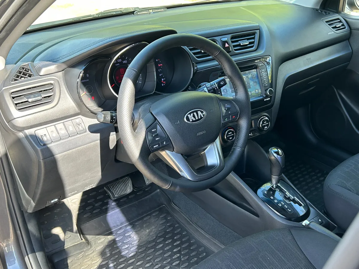 Kia Rio 1.6 AT (123 л.с.), 2013 — фото 5