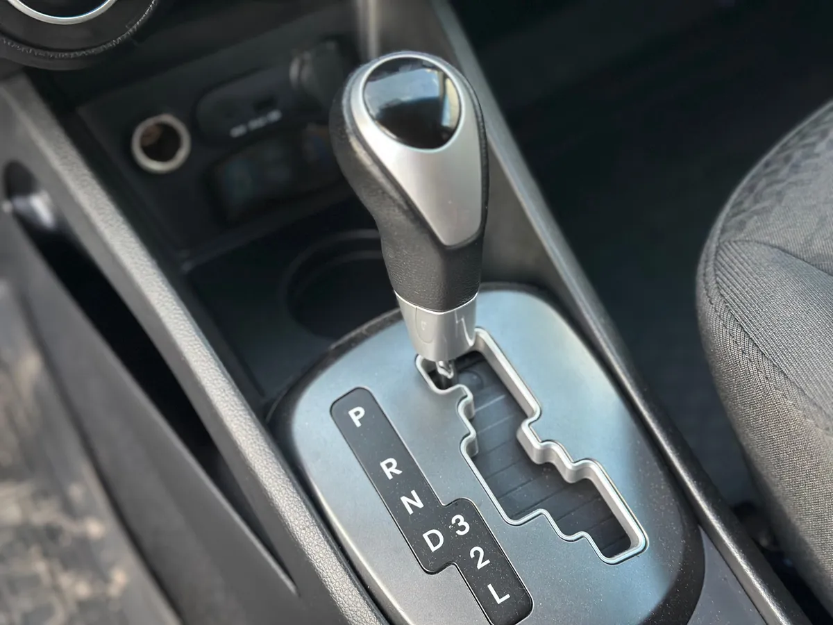Kia Rio 1.4 AT (107 л.с.), 2014 — фото 15
