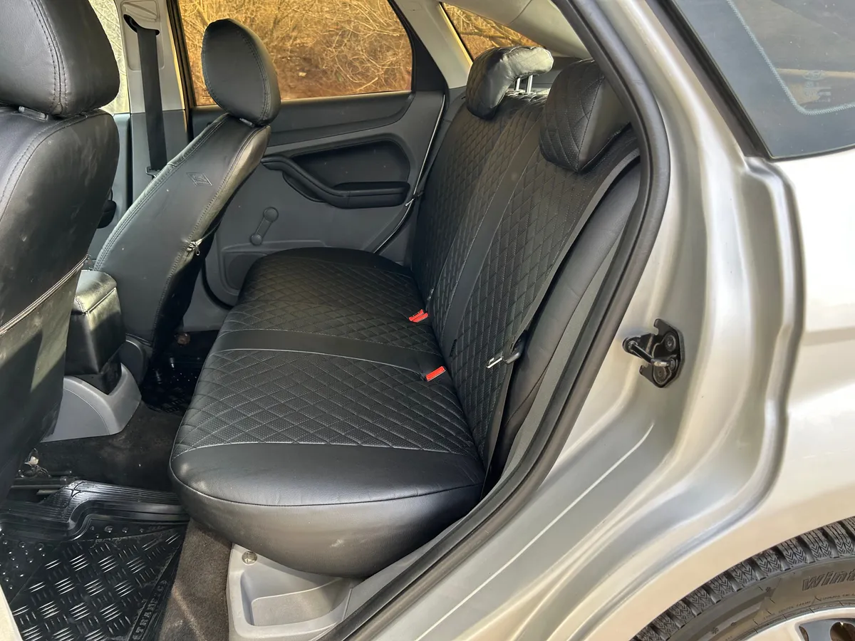 Ford Focus 1.6 AT (101 л.с.)