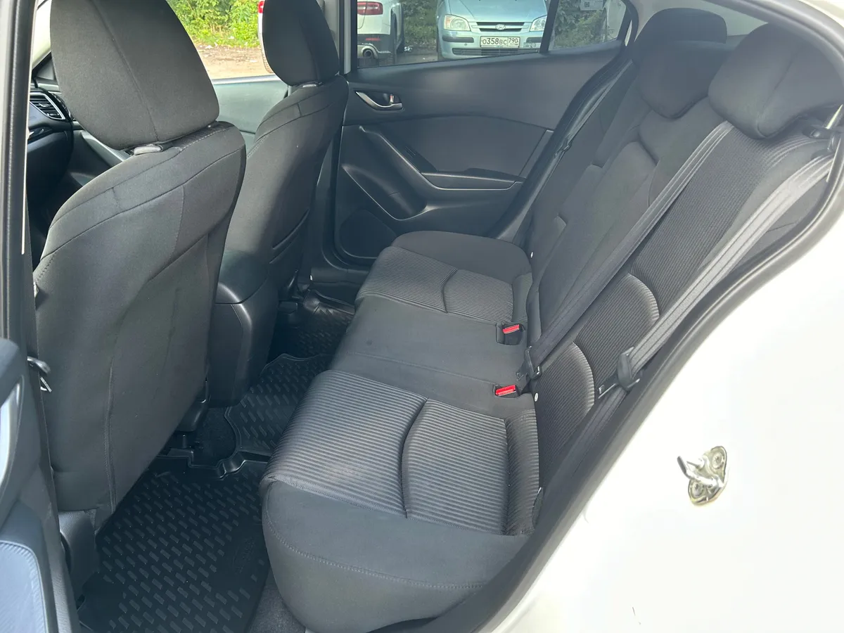 Mazda 3 1.6 AT (104 л.с.)