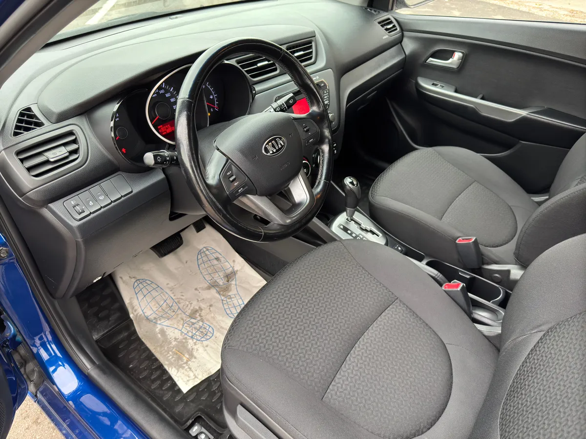 Kia Rio 1.4 AT (107 л.с.), 2014 — фото 5