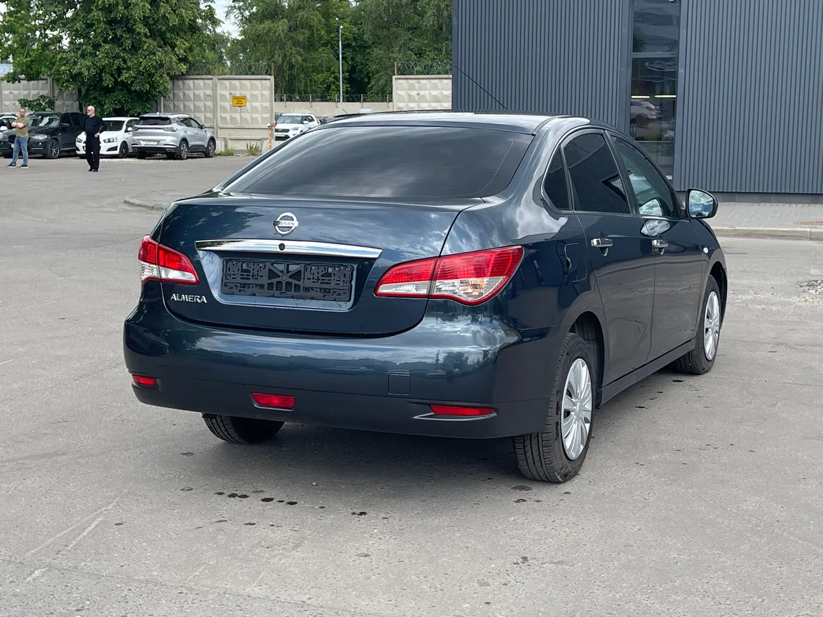 Nissan Almera 1.6 AT (102 л.с.)