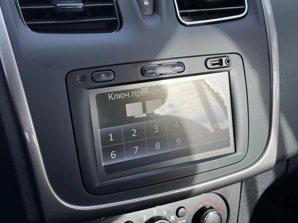 Renault Logan 1.6 AT (102 л.с.)