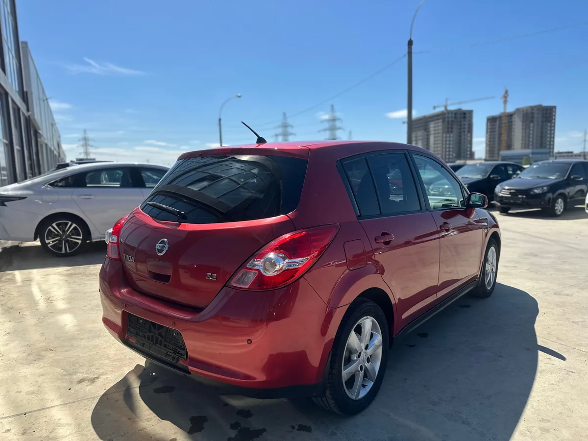 Nissan Tiida 1.6 AT (110 л.с.)