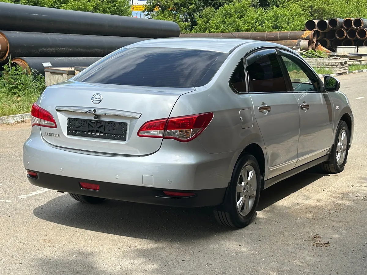 Nissan Almera 1.6 AT (102 л.с.)