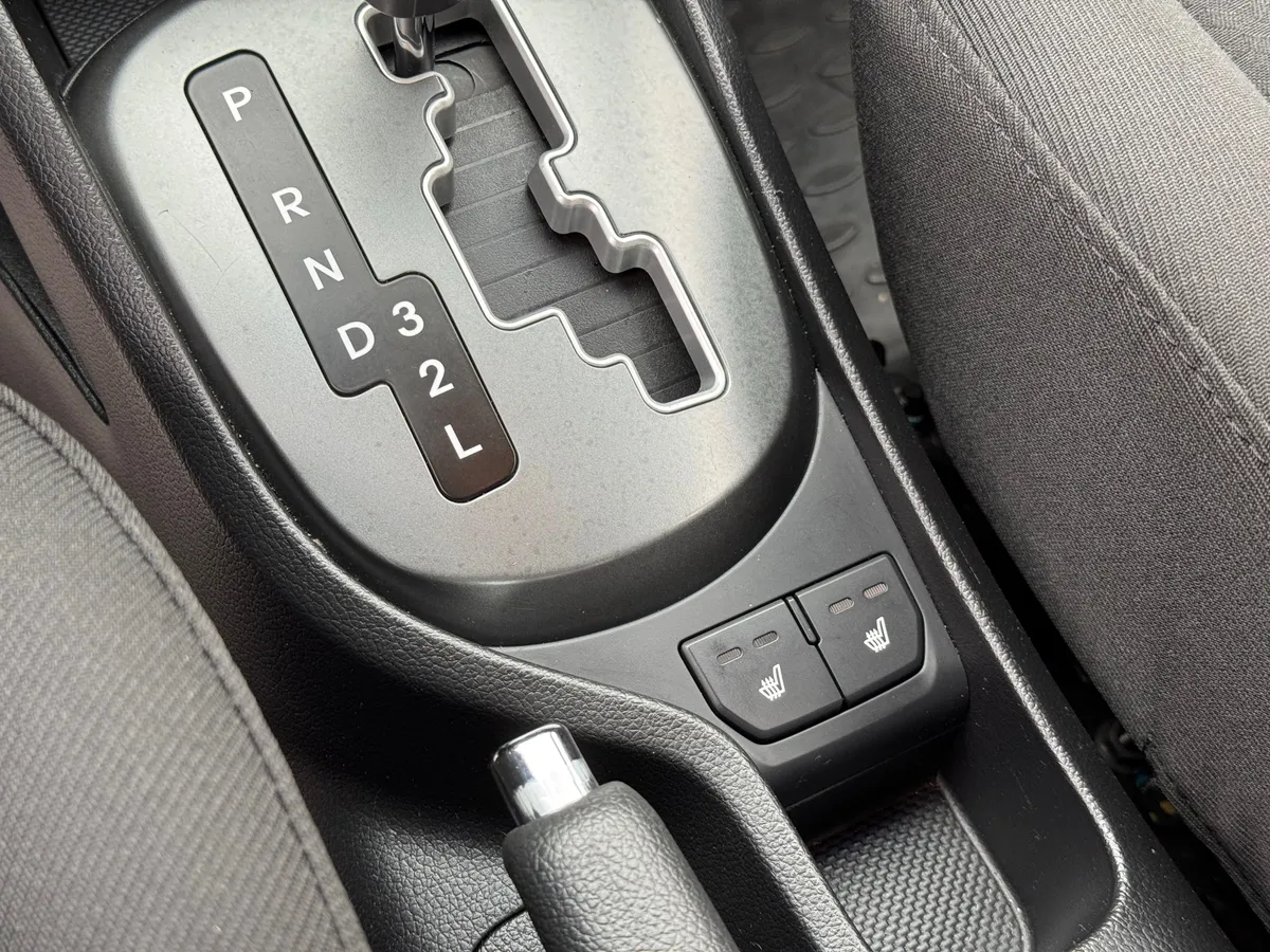 Kia Rio 1.4 AT (107 л.с.), 2014 — фото 10