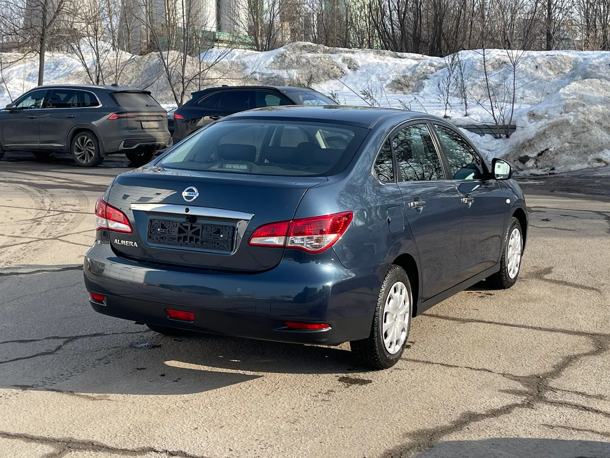 Nissan Almera 1.6 MT (102 л.с.)