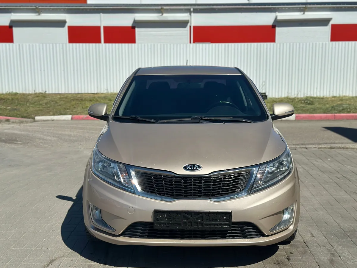 Kia Rio 1.6 MT (123 л.с.), 2013 — фото 5