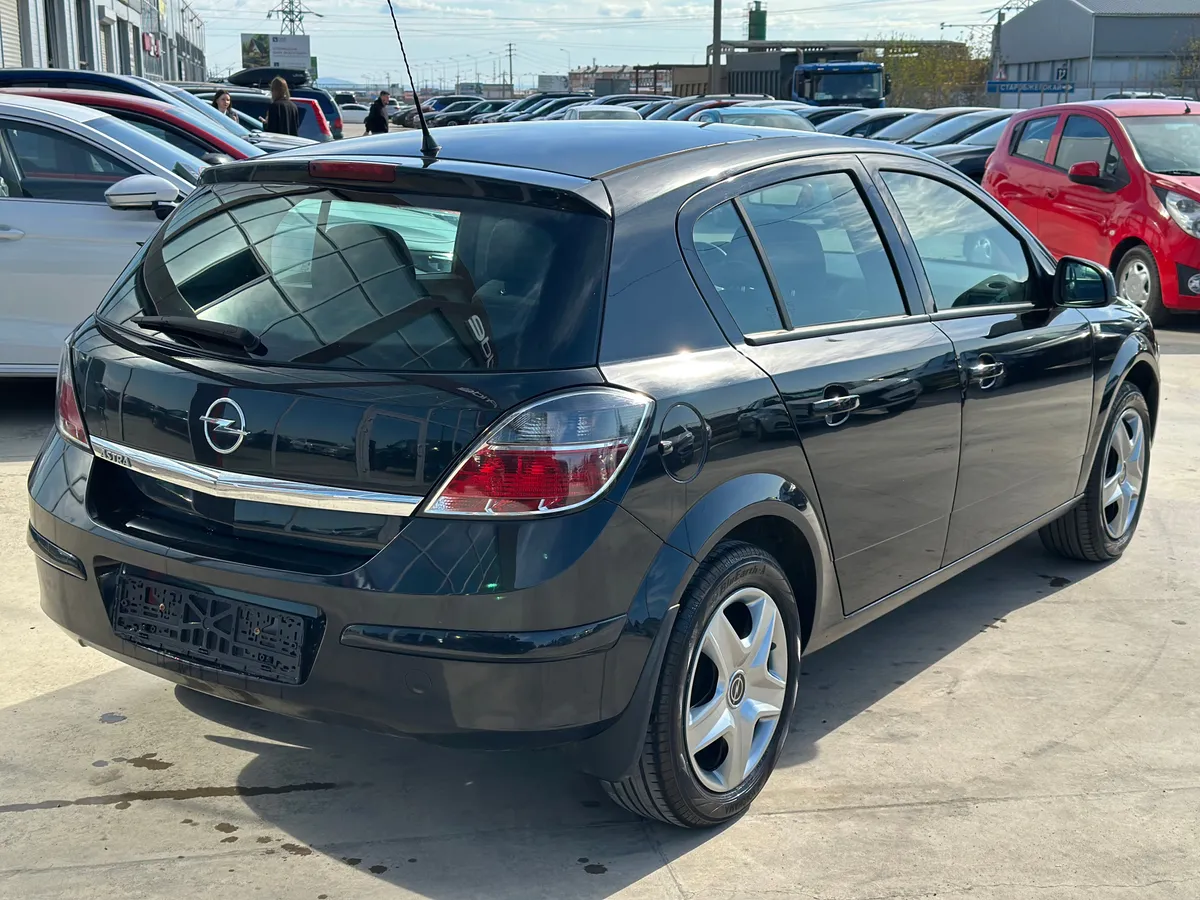 Opel Astra 1.8 AT (140 л.с.)