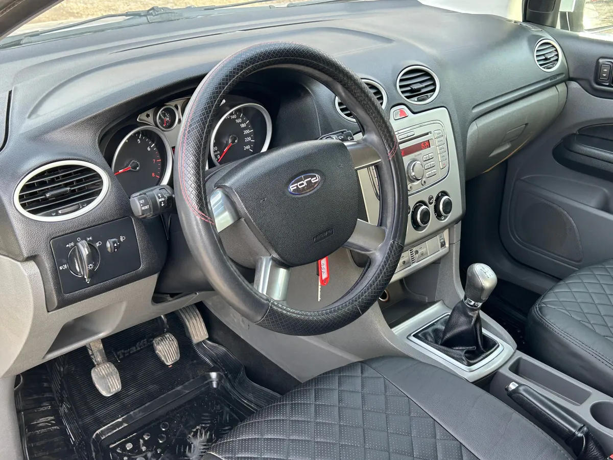 Ford Focus 1.6 AT (101 л.с.)