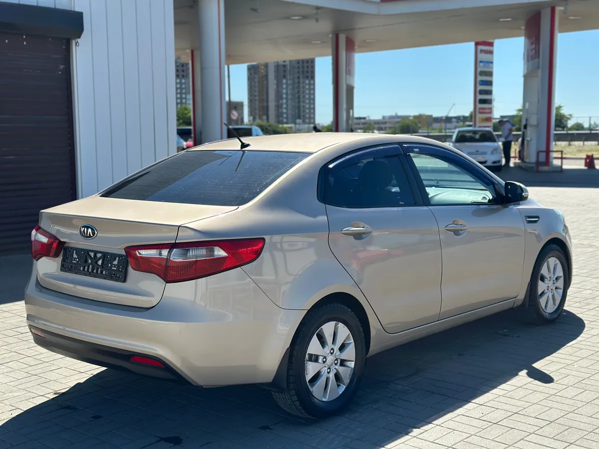 Kia Rio 1.6 MT (123 л.с.), 2013 — фото 4