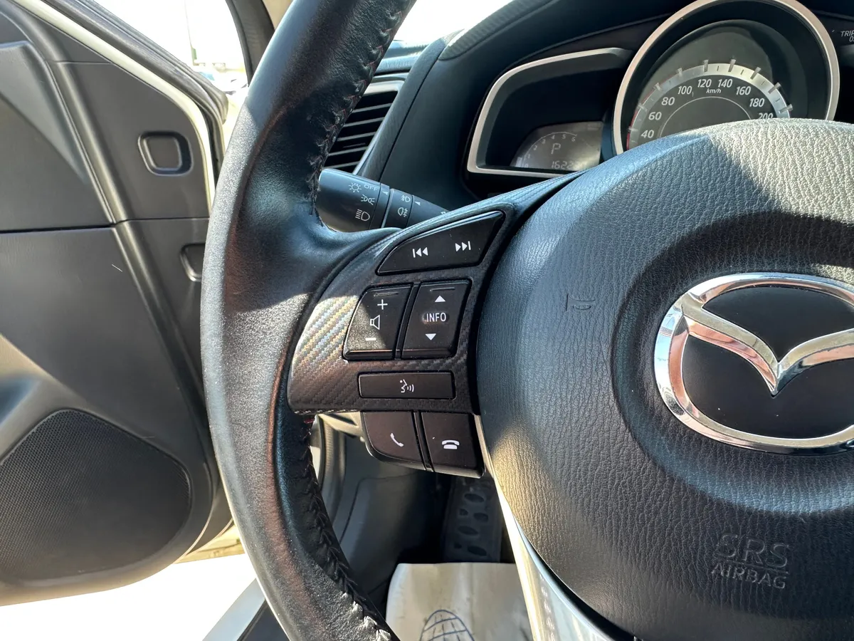 Mazda 3 1.6 AT (104 л.с.)