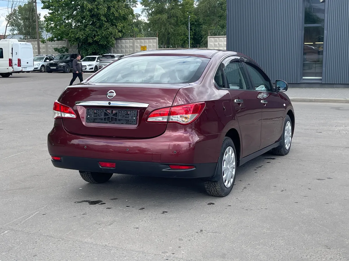 Nissan Almera 1.6 AT (102 л.с.)