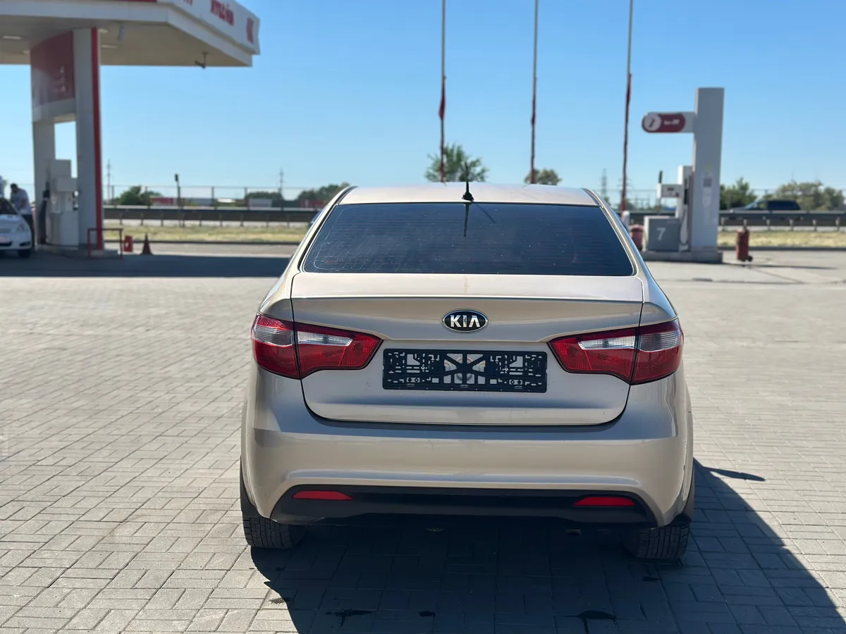 Kia Rio 1.6 MT (123 л.с.), 2013 — фото 6