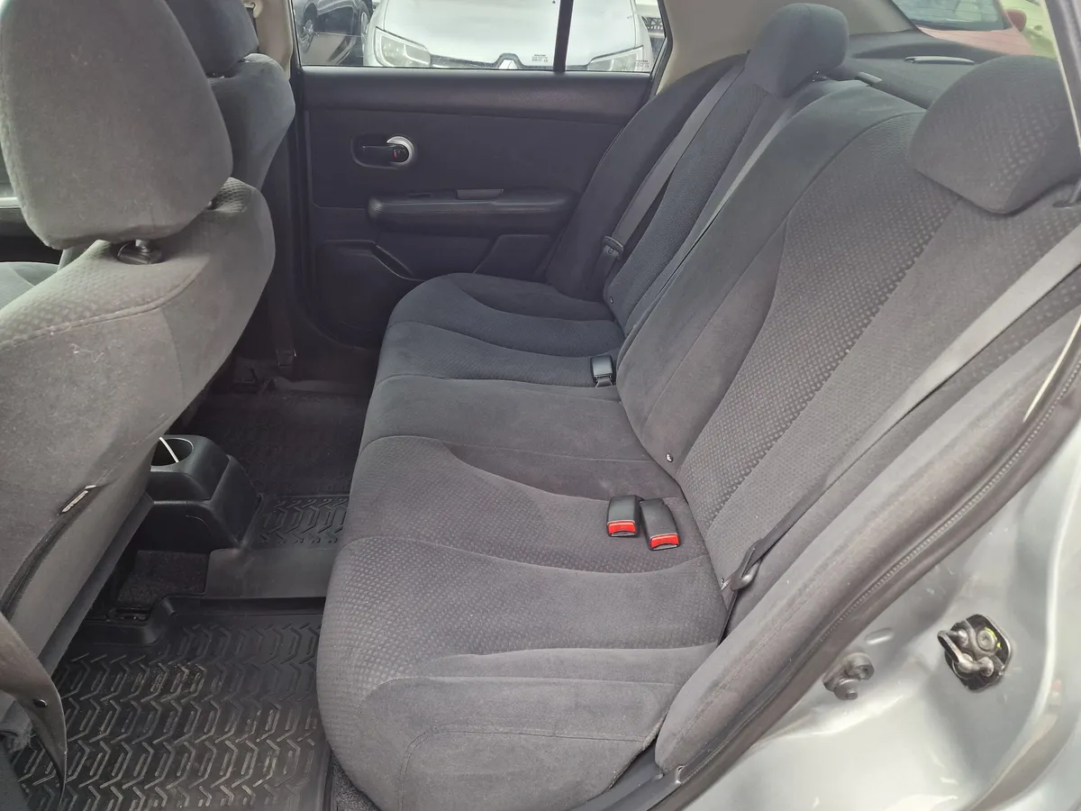 Nissan Tiida 1.6 AT (110 л.с.)