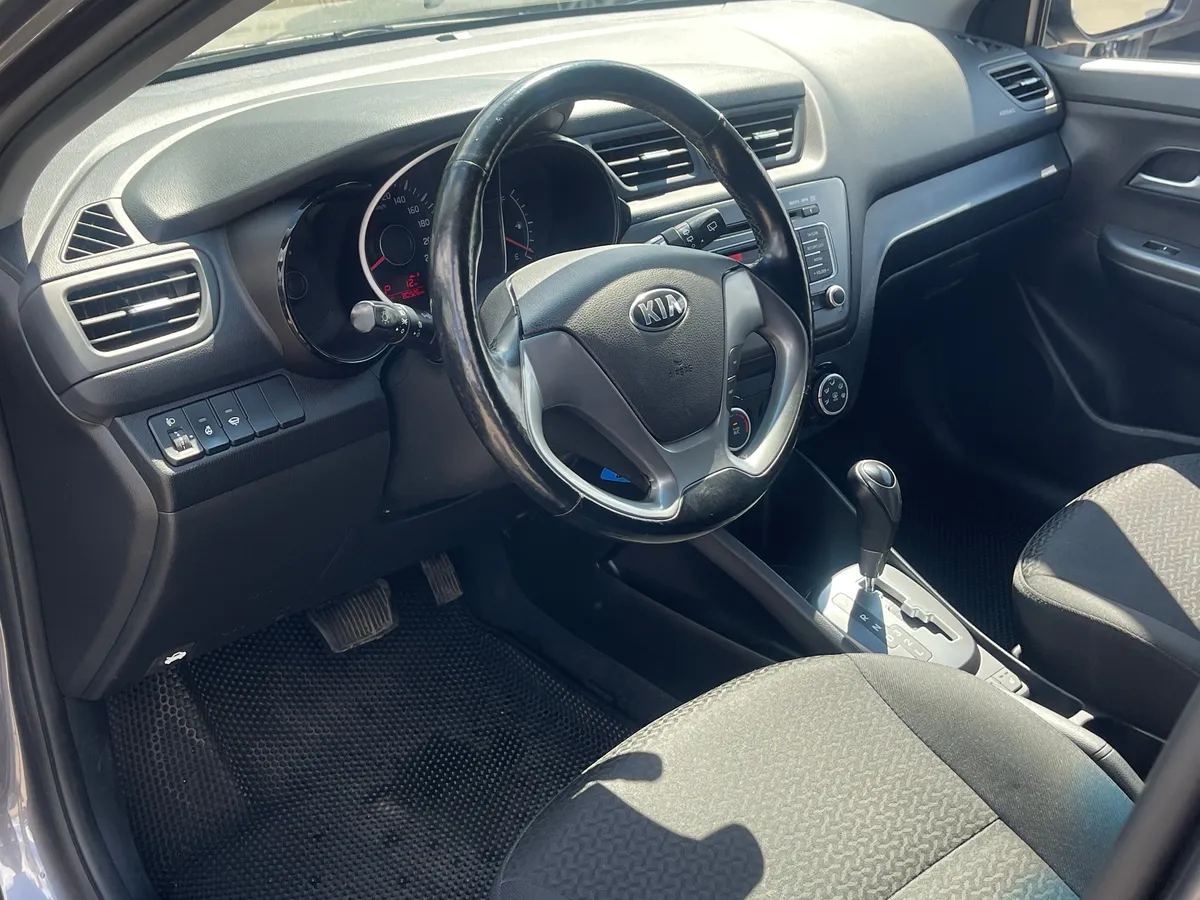 Kia Rio 1.4 AT (107 л.с.), 2015 — фото 5