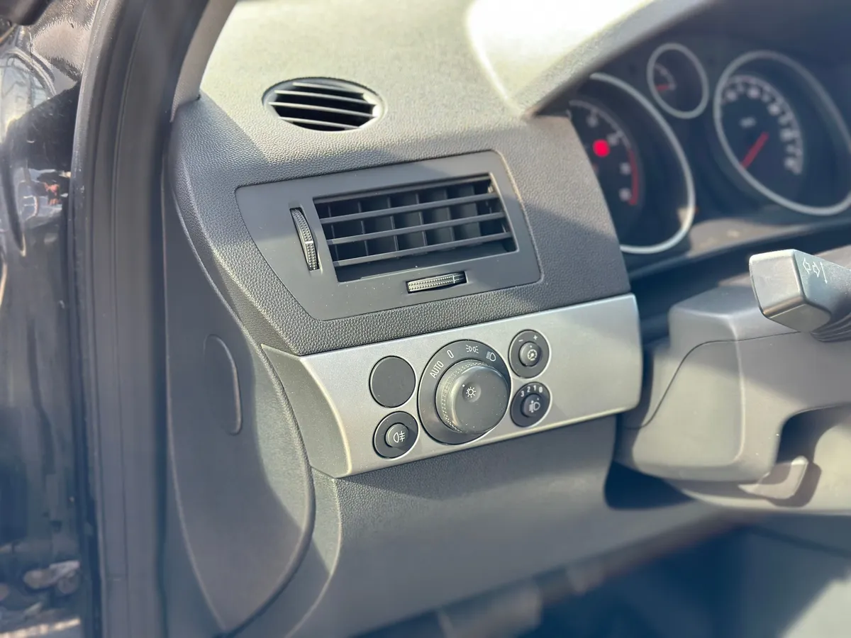 Opel Astra 1.8 AT (140 л.с.)