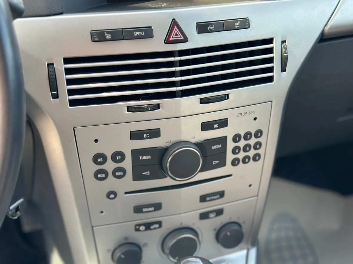 Opel Astra 1.8 AT (140 л.с.)